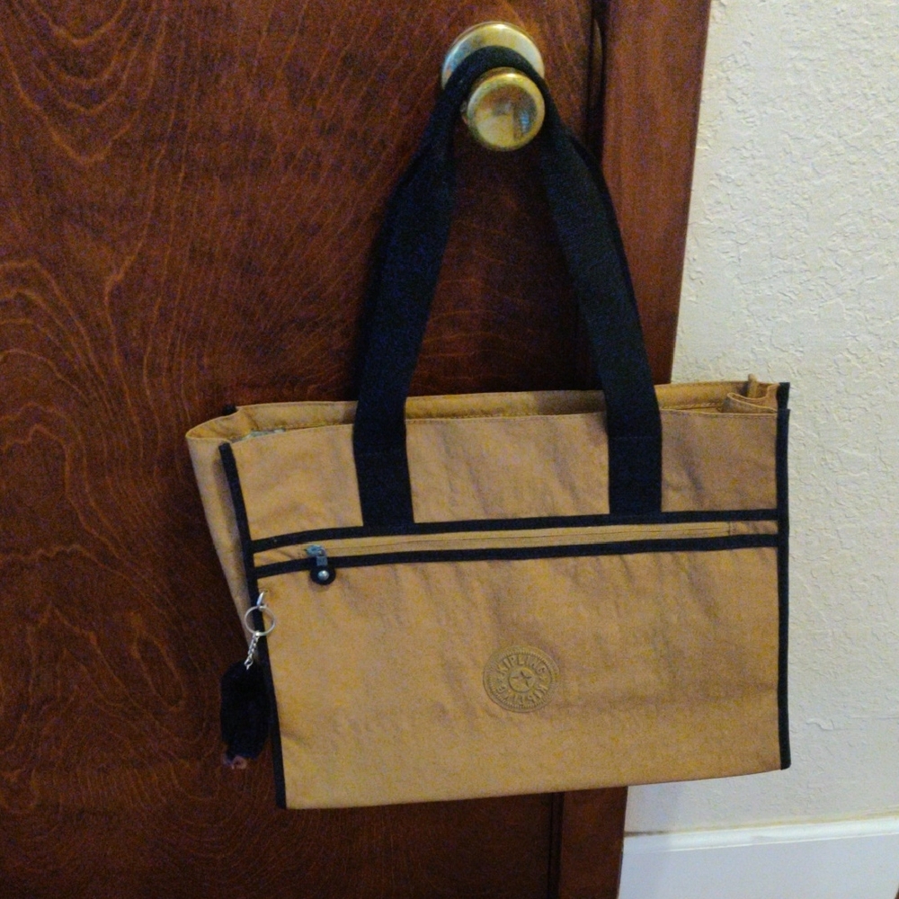 Gorgeous Kipling Tote In mustard Color With Black Trim NWOT